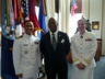Guest (in middle) graduating from the Navy War College